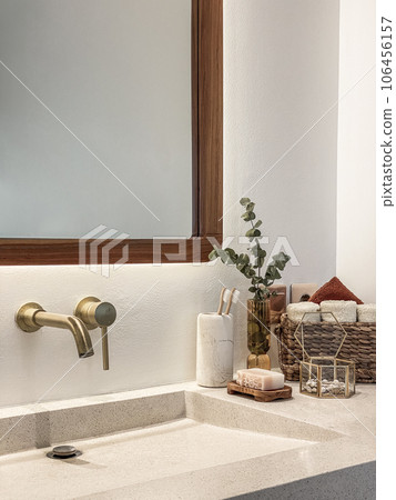 Modern bathroom  with golden modern mixer tap 106456157