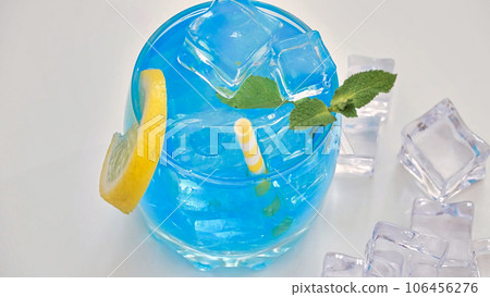 blue lemonade in a glass with ice 106456276