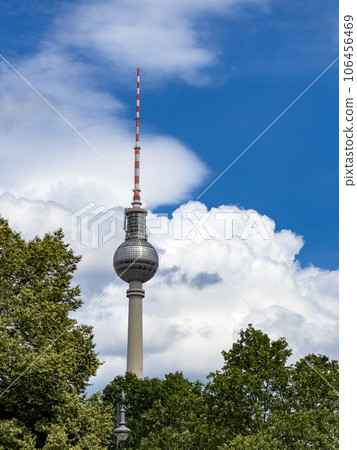 Alexanderplatz TV tower on the beautiful blue sky background with  clouds. 106456469