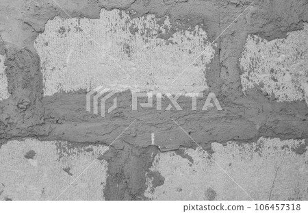 wall of large gray brick blocks with cement joints. wall of large gray brick blocks with cement joints. 106457318