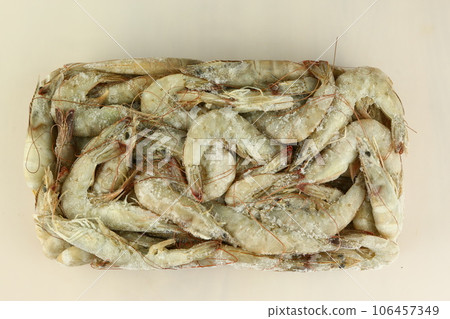 frosted king prawns closeup photo on white table background frosted king prawns closeup photo on white table background 106457349