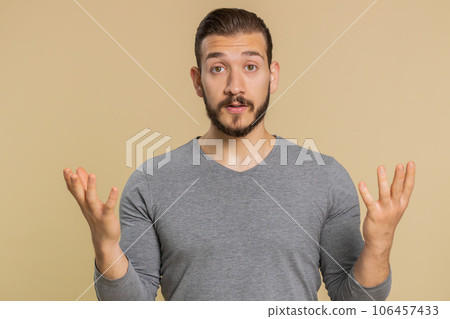 Excited amazed man surprise looking at camera with big eyes, shocked by sudden victory wow emotion Excited amazed man surprise looking at camera with big eyes, shocked by sudden victory wow emotion 106457433