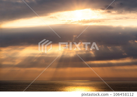 The sun's rays over the sea. for backgroud 106458112
