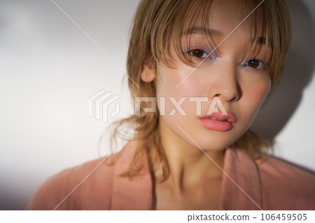 Fashion portrait image of a woman with light and shadow Fashion portrait image of a woman with light and shadow 106459505
