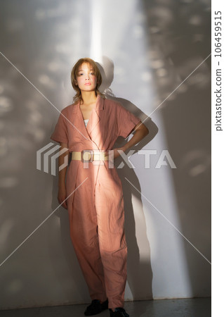 Fashion portrait image of a woman with light and shadow 106459515