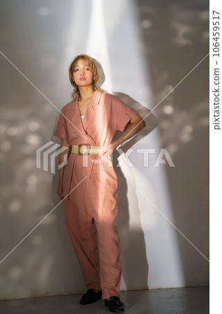 Fashion portrait image of a woman with light and shadow 106459517