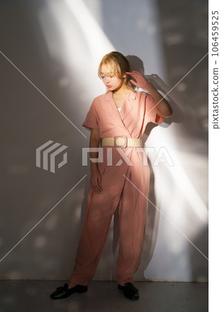 Fashion portrait image of a woman with light and shadow 106459525