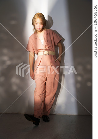 Fashion portrait image of a woman with light and shadow 106459556
