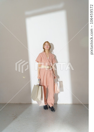 Fashion portrait image of a woman with light and shadow 106459572