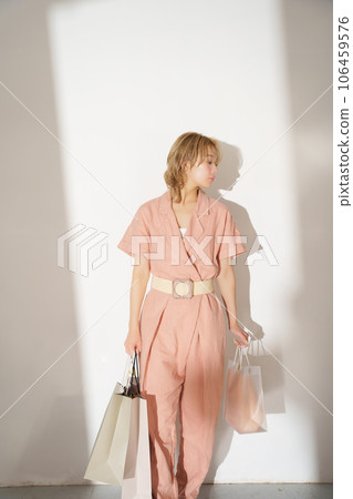 Fashion portrait image of a woman with light and shadow 106459576