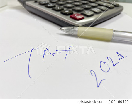 Black calculator in tax managment. Black calculator in tax managment. 106460521