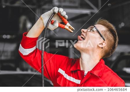Mechanic male electricity man with charging battery clamps tool clip tongue for charging body self energy powerful man Mechanic male electricity man with charging battery clamps tool clip tongue for charging body self energy powerful man 106465684