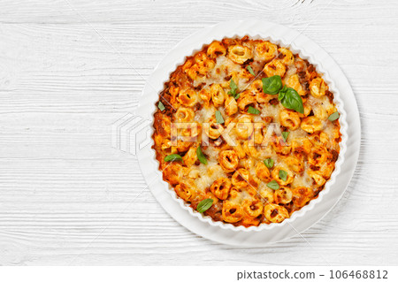 tortellini bake with cheese, tomato sauce, beef tortellini bake with cheese, tomato sauce, beef 106468812