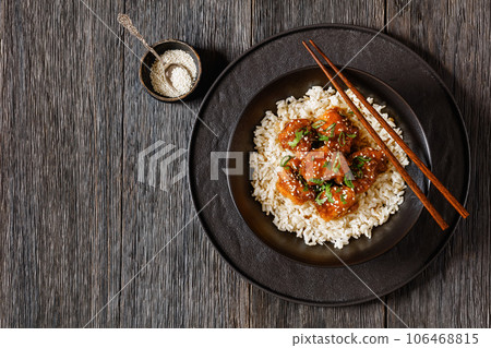 Baked Honey Sesame Chicken with brown rice Baked Honey Sesame Chicken with brown rice 106468815