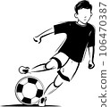 young man playing soccer black and white 106470387