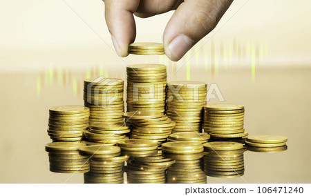 Businessman puts a coin on a pile of gold coins. Investment finance business idea. Business growing concept to success. Business success concept wealth stock investment. Technology grow concept. Businessman puts a coin on a pile of gold coins. Investment finance business idea. Business growing concept to success. Business success concept wealth stock investment. Technology grow concept. 106471240