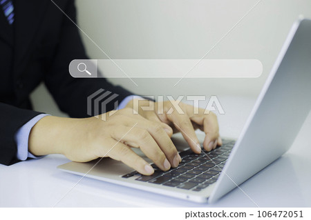 Technology Search Engine Optimization Concept . Businessman click Internet Data Search Engine. Internet browsing Information network concept. Hand is using laptop to find information using Search. Technology Search Engine Optimization Concept . Businessman click Internet Data Search Engine. Internet browsing Information network concept. Hand is using laptop to find information using Search. 106472051