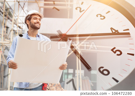 Happy construction project engineer manager overlay with time clock for good control timing punctual building house renovate concept 106472280