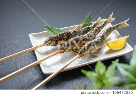 Spicy skewers of sweetfish 106472880
