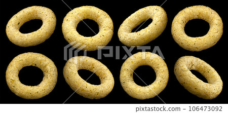 Crispy onion rings isolated on black background 106473092