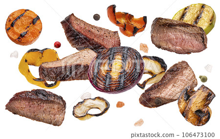 Grilled beef slices and vegetables isolated on white background 106473100