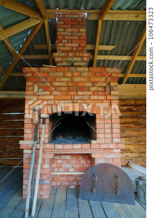 The Russian red brick stove. Russian village life and culture The Russian red brick stove. Russian village life and culture 106473323