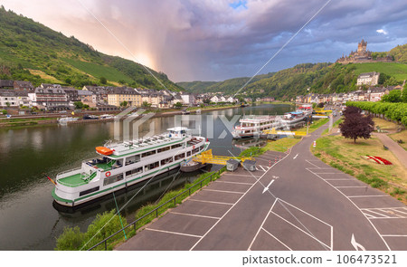 City embankment along the banks of the Moselle River in Cochem. City embankment along the banks of the Moselle River in Cochem. 106473521