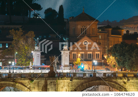 Rome, Italy. Hospital Of Holy Spirit And Aelian Bridge In Evening Night Illuminations. night stars sky, cosmos, space Rome, Italy. Hospital Of Holy Spirit And Aelian Bridge In Evening Night Illuminations. night stars sky, cosmos, space 106474620
