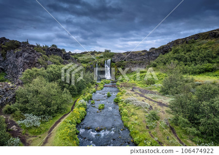 Gjain waterfall flowing in Pjorsardalur lush valley during summer at Iceland Gjain waterfall flowing in Pjorsardalur lush valley during summer at Iceland 106474922