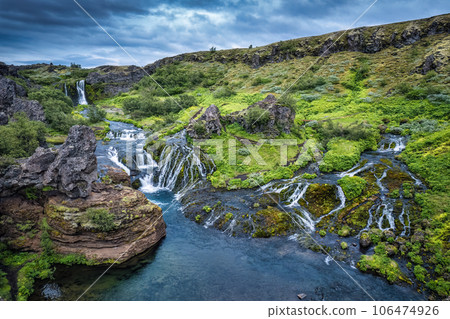 Gjain waterfall flowing in Pjorsardalur lush valley during summer at Iceland 106474926