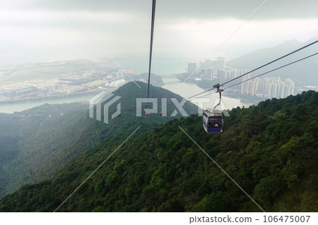 View from Nhong Ping 360 cable car crossing over the mountain in Tung Chung and Lantau Island 106475007