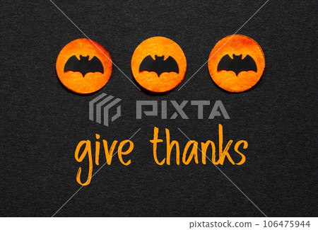Black Halloween Background With Orange Dots And Text Give Thanks 106475944