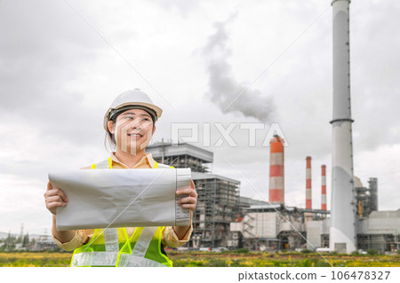 Engineer woman worker with floor plan industry construction designer project manager looking site field working Engineer woman worker with floor plan industry construction designer project manager looking site field working 106478327