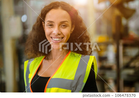 portrait african american black woman worker happy smile work in heavy metal machine industry portrait african american black woman worker happy smile work in heavy metal machine industry 106478370