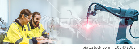engineer team working with welding robot arm for industry technology advertising wide banner 106478393