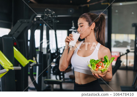 sport healthy woman drinking milk and vegetable good source of whey protein and vitamin for muscle healthcare 106478410