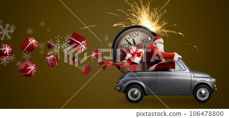 Christmas is coming. Santa Claus on toy car delivering New Year 2024 gifts and countdown clock at blue background with fireworks Christmas is coming. Santa Claus on toy car delivering New Year 2024 gifts and countdown clock at blue background with fireworks 106478800