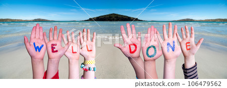 Children Hands Building Word Well Done, Sea And Ocean Background 106479562