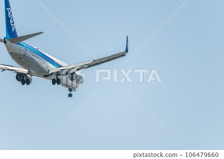 [Back view of ANA aircraft in preparation for landing from the sky above Jonanjima Seaside Park] 106479660