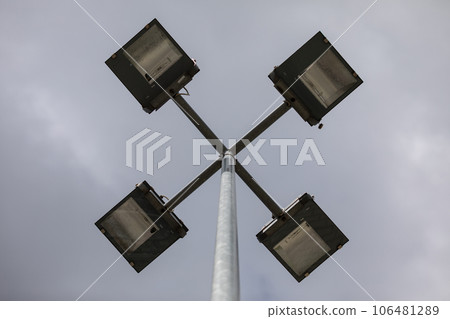 Bottom view of four lighting tubes used on city streets. Bottom view of four lighting tubes used on city streets. 106481289