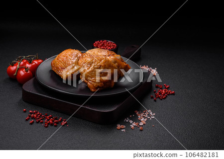Delicious grilled chicken thighs with salt, spices and herbs 106482181