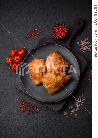 Delicious grilled chicken thighs with salt, spices and herbs 106482184