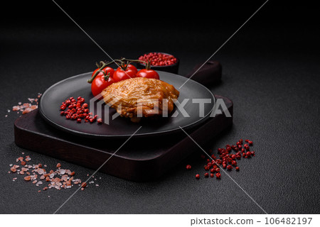 Delicious grilled chicken thighs with salt, spices and herbs Delicious grilled chicken thighs with salt, spices and herbs 106482197