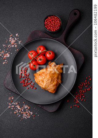 Delicious grilled chicken thighs with salt, spices and herbs 106482199