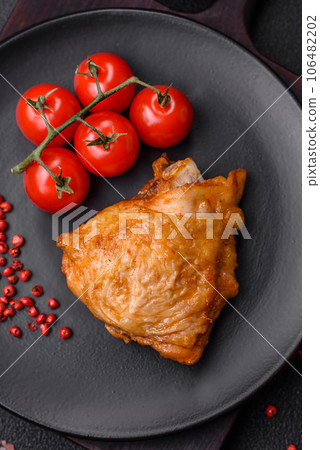 Delicious grilled chicken thighs with salt, spices and herbs 106482202
