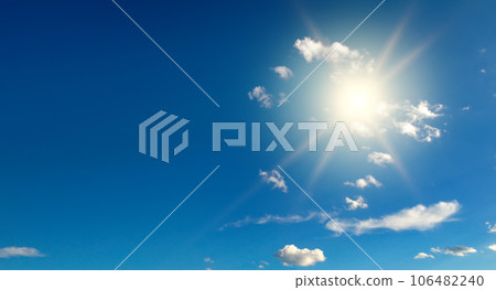 Bright sun on blue sky with beautiful clouds Bright sun on blue sky with beautiful clouds 106482240