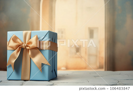 Blue gift box with beige bow on beige blue background. Generative AI 106483847