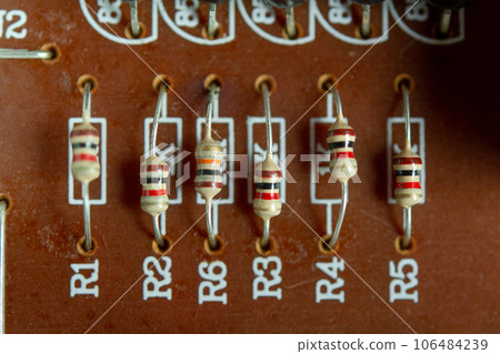 Closeup electronic hardware .Resistor on the white circuit board. Closeup electronic hardware .Resistor on the white circuit board. 106484239