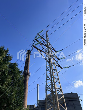 power lines close-up view from below with blue sky on the background, Kaunas, Lithuania 106486805