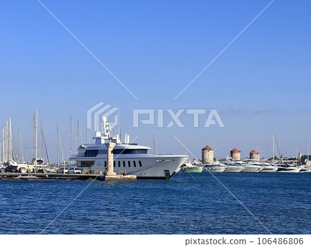 Colossus of Rhodes sunny day blue sky, Greece 106486806